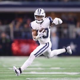 Dallas Cowboys running back Tony Pollard (20) runs the ball