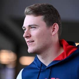 New England Patriots quarterback Mac Jones (10) arrives to a press conference