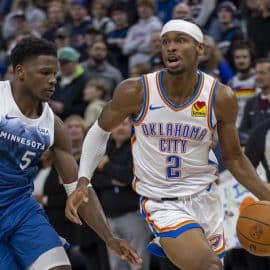 Oklahoma City Thunder guard Shai Gilgeous-Alexander dribbles the ball.