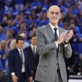 Adam Silver claps his hands.