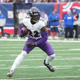 Baltimore Ravens running back Derrick Henry runs the ball.